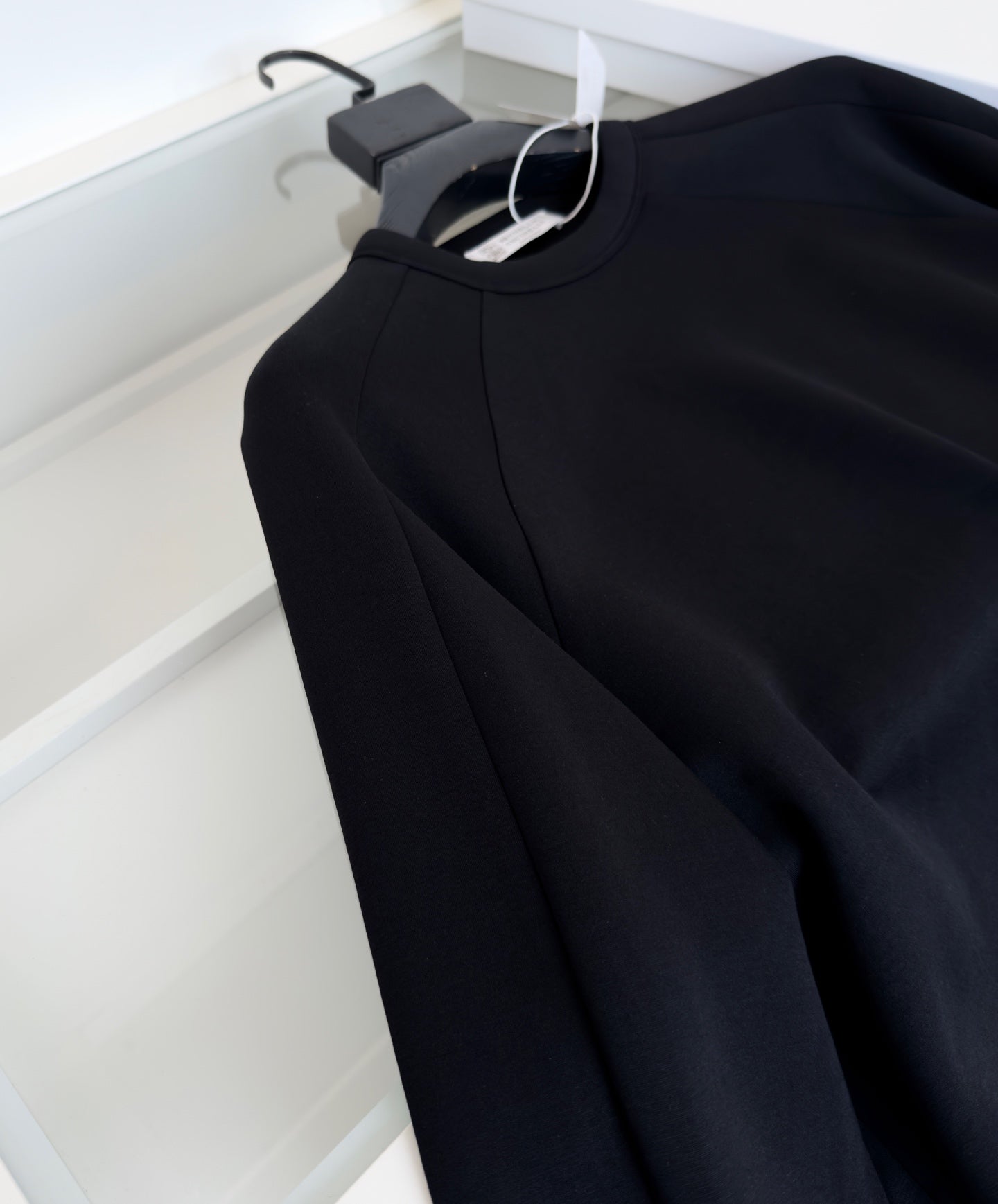 BRUNELLO CUCINELLI MINIMALIST STRUCTURAL GEOMETRIC CUTTING BLACK SWEATSHIRT
