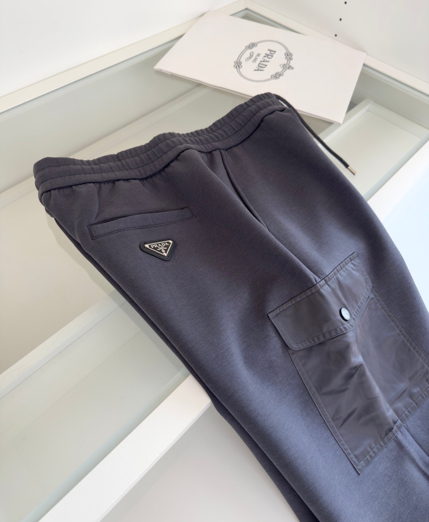PRADA COTTON FLEECE JOGGERS WITH RE-NYLON DETAILS GREY PANTS