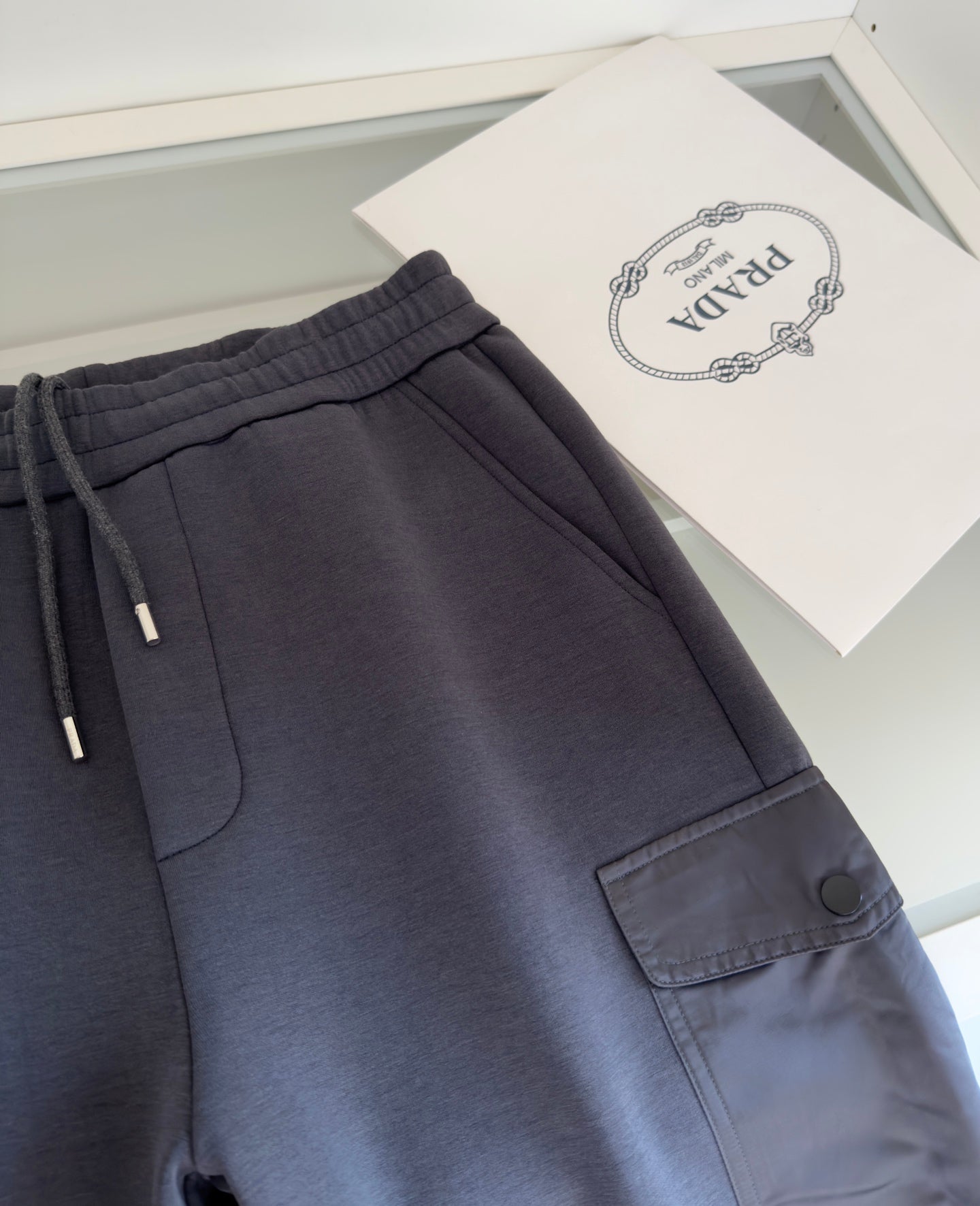 PRADA COTTON FLEECE JOGGERS WITH RE-NYLON DETAILS GREY PANTS